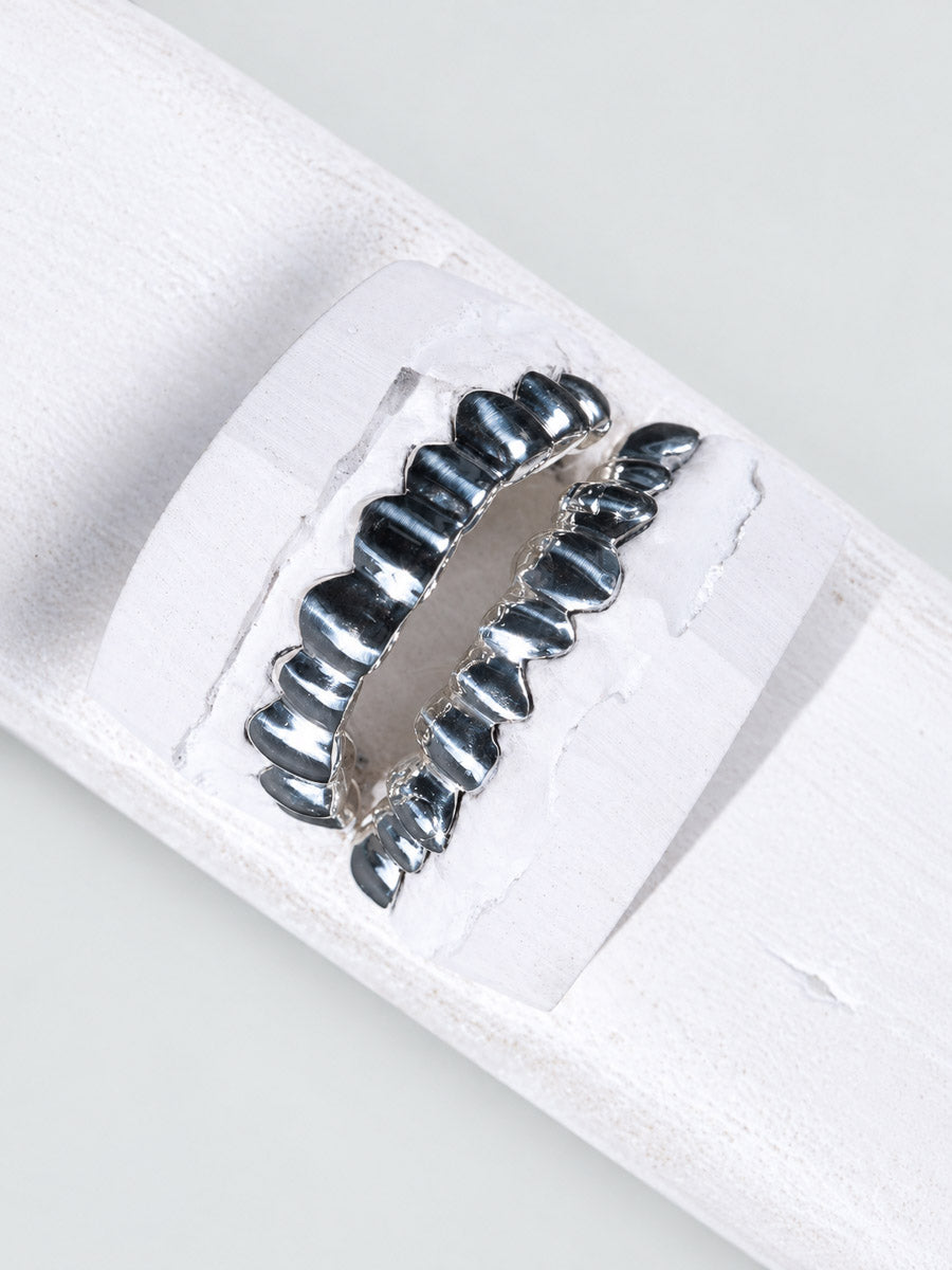 Full set classic grillz in white gold, top and bottom teeth, polished finish on dental mould