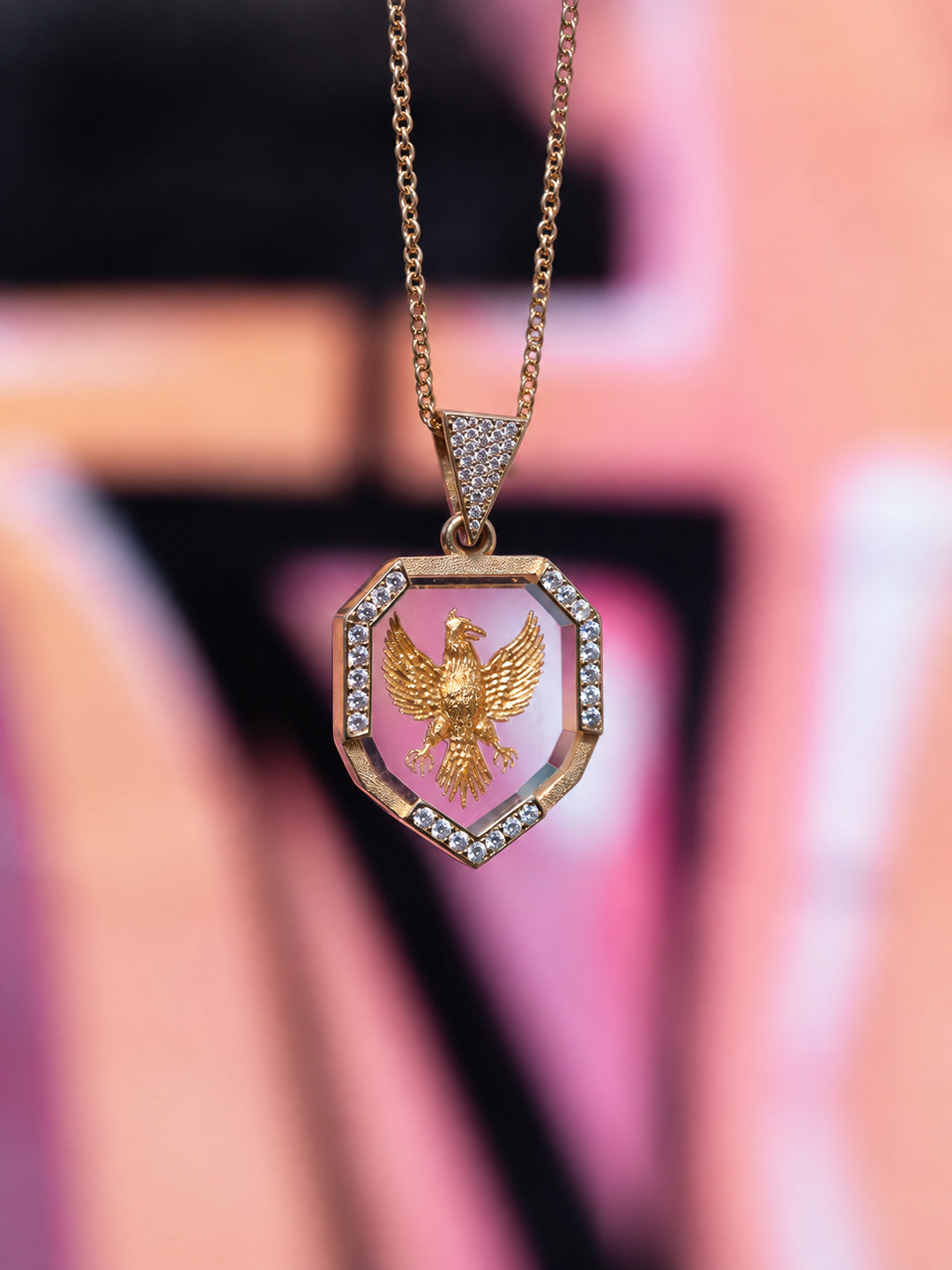 Custom eagle intaglio pendant in yellow gold with diamond border, bespoke by Illoom Sydney