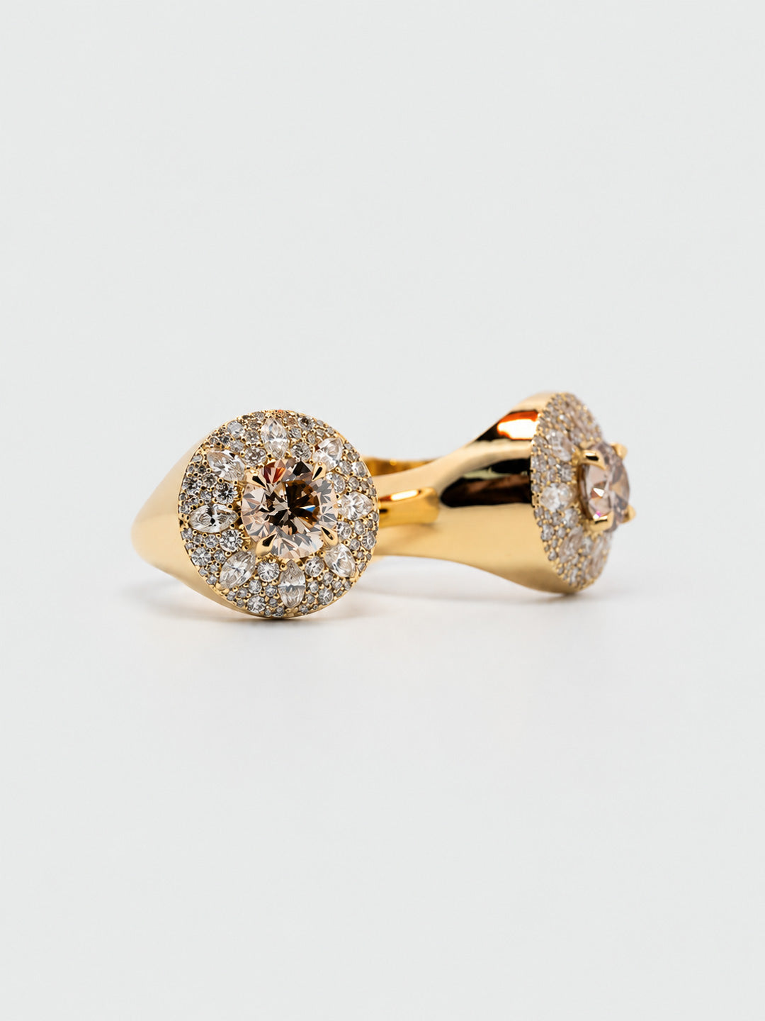 Custom engagement ring in 18k yellow gold with champagne diamond centre and round and marquise diamond halo, by Illoom Sydney