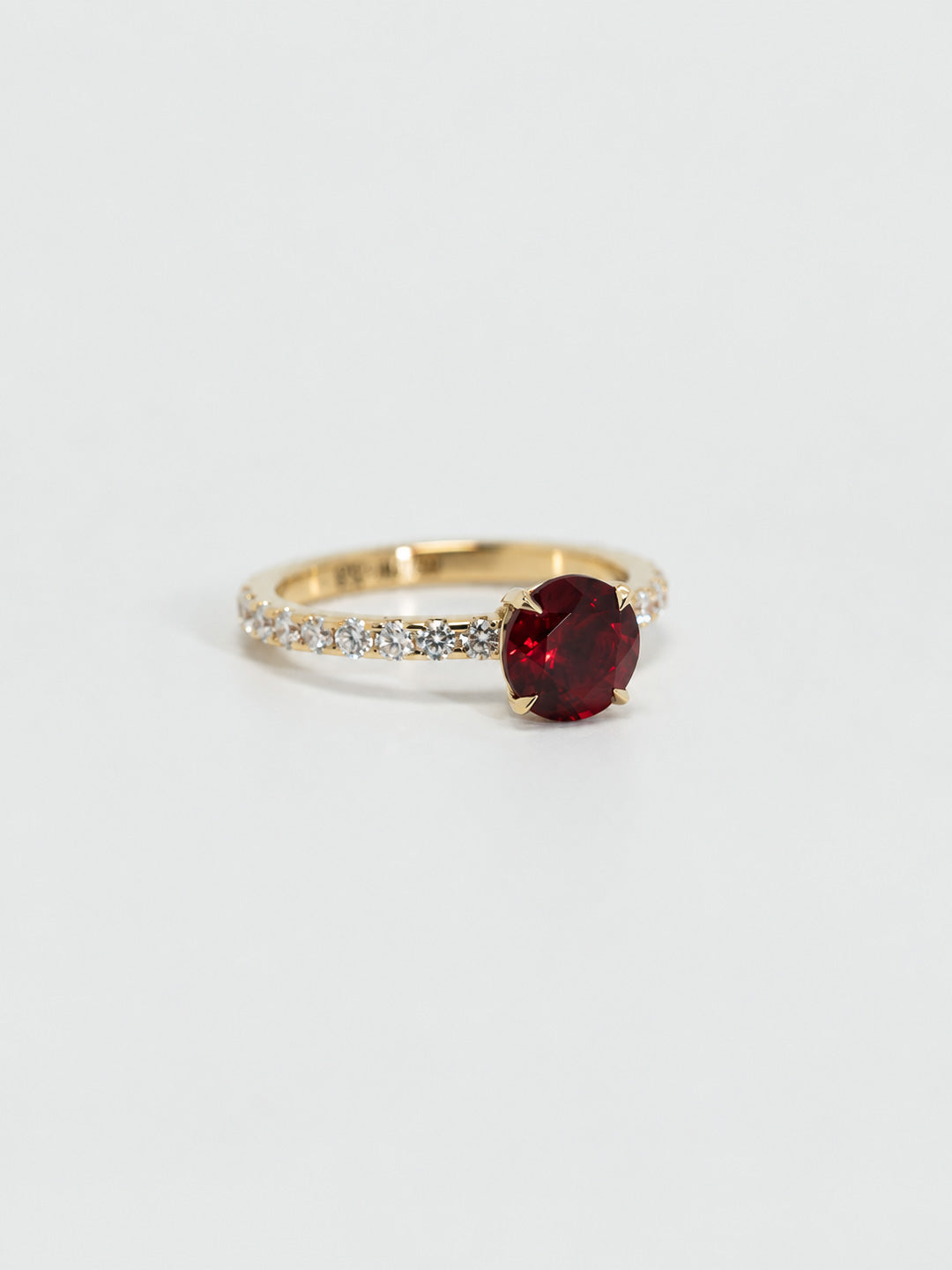 Custom ruby engagement ring in 18k yellow gold with pavé diamond half-eternity band, by Illoom Sydney