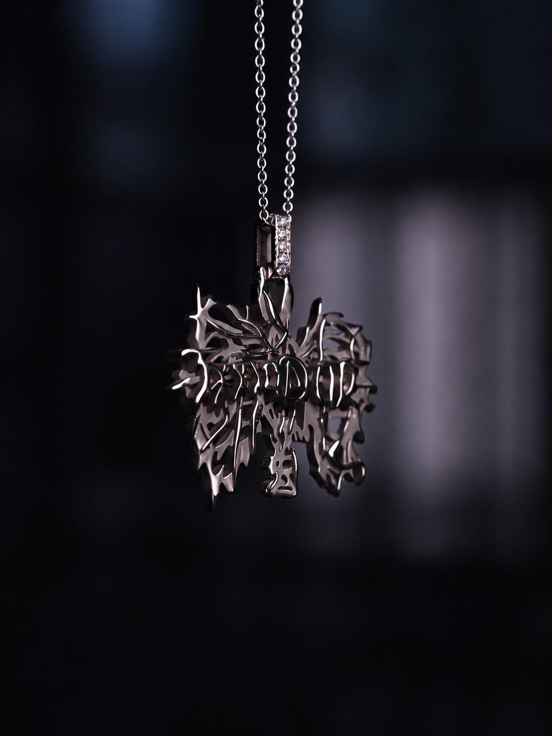 Custom graffiti-style hand-pierced lettering pendant in white gold with pavé diamond bail, bespoke by Illoom Sydney