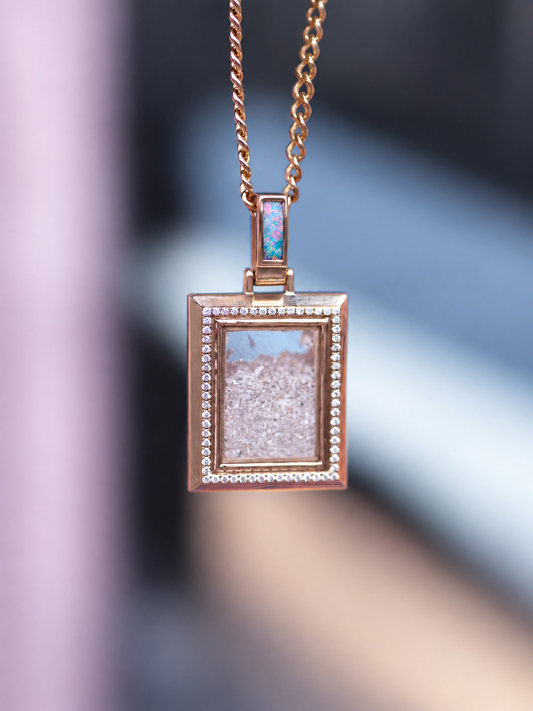 Custom memorial urn pendant in gold with pavé diamonds and opal detail,  bespoke by Illoom Sydney