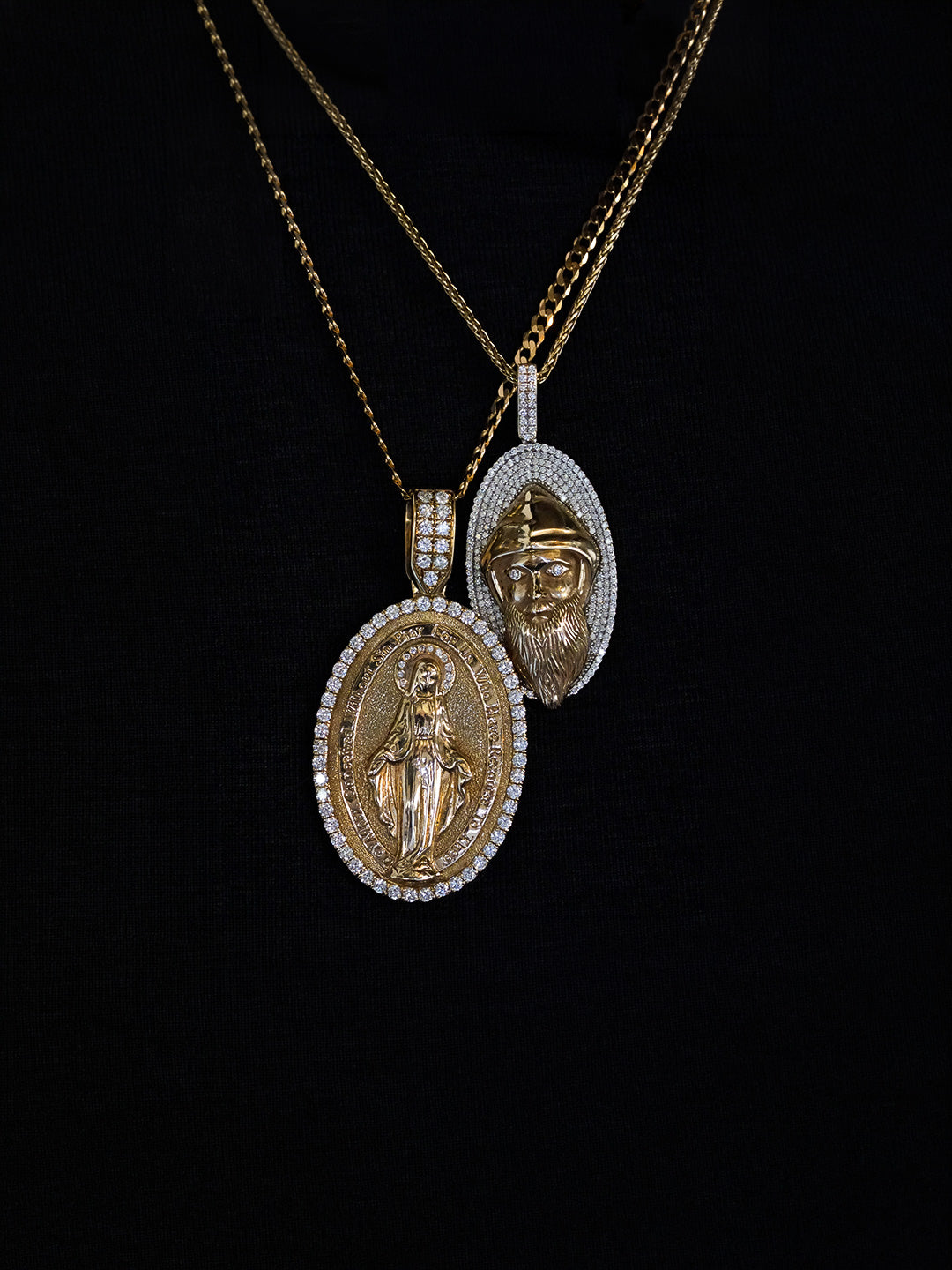 Custom Miraculous Medal and Saint Charbel religious pendants in gold with pavé white diamonds worn, bespoke by Illoom Sydney