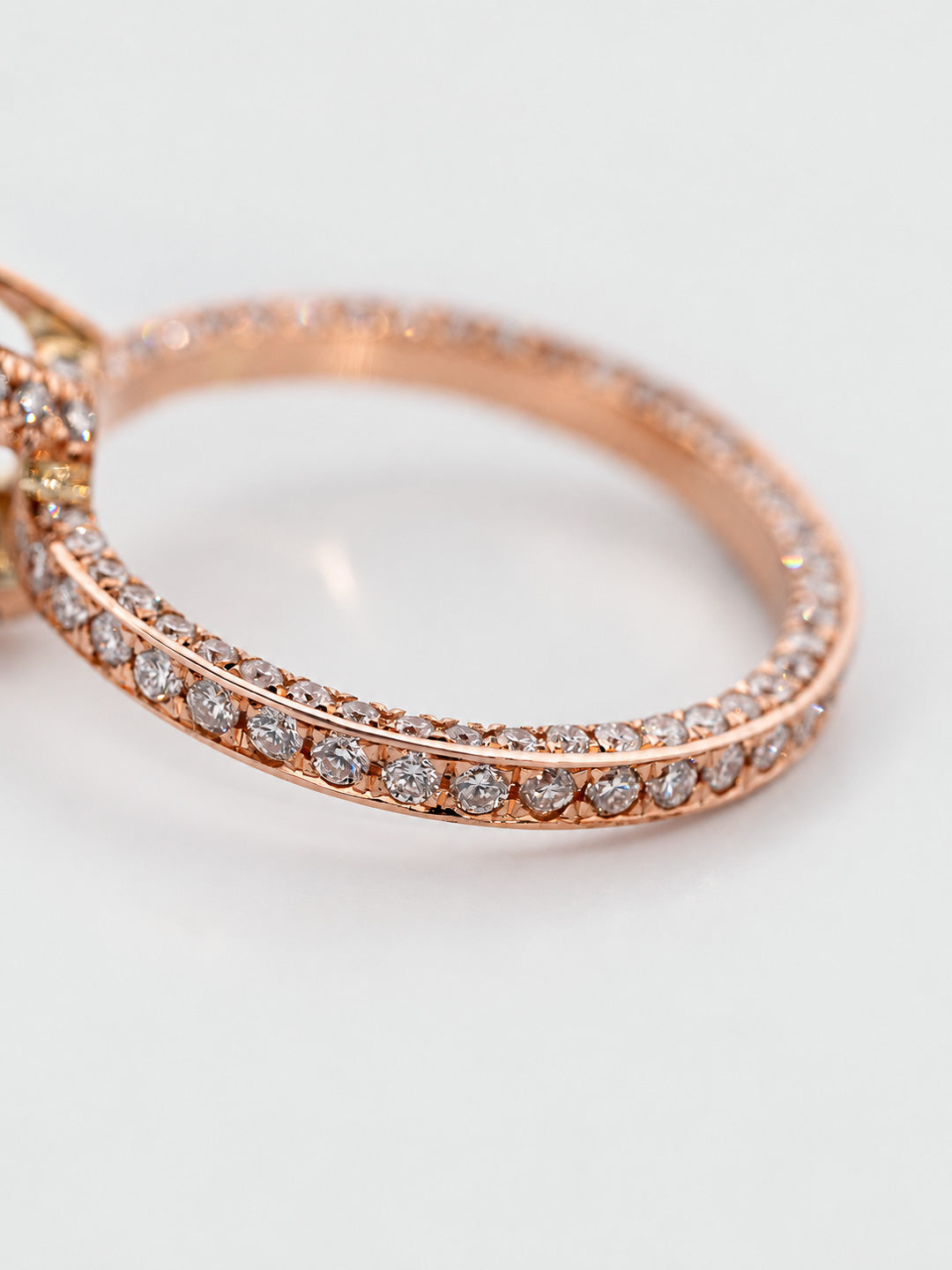 Custom full eternity wedding band in rose gold with pavé white diamonds, bespoke by Illoom Sydney