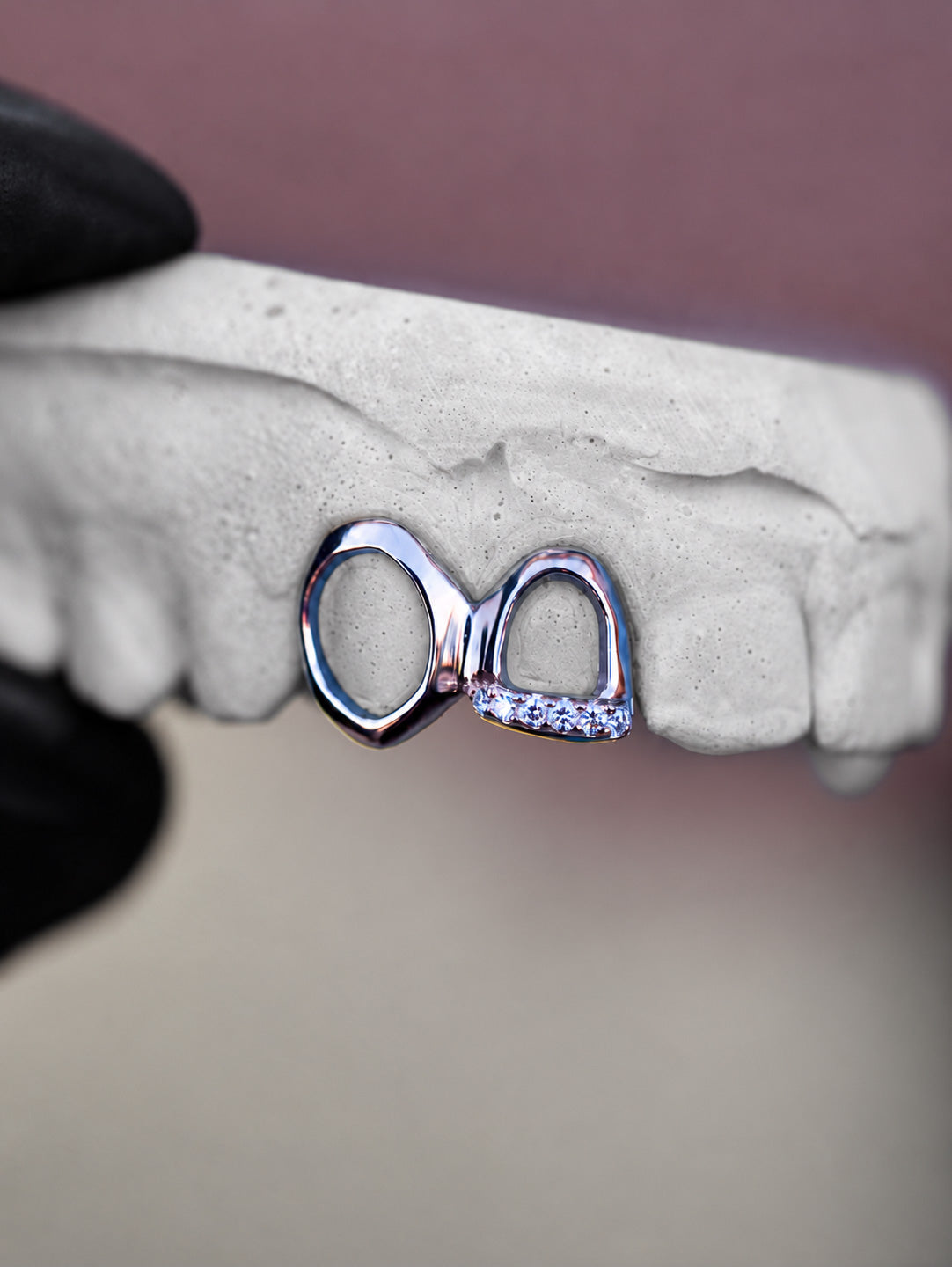 Two tooth diamond window grillz in 18k white gold, one plain polished window and one pavé window, bespoke by Illoom Sydney