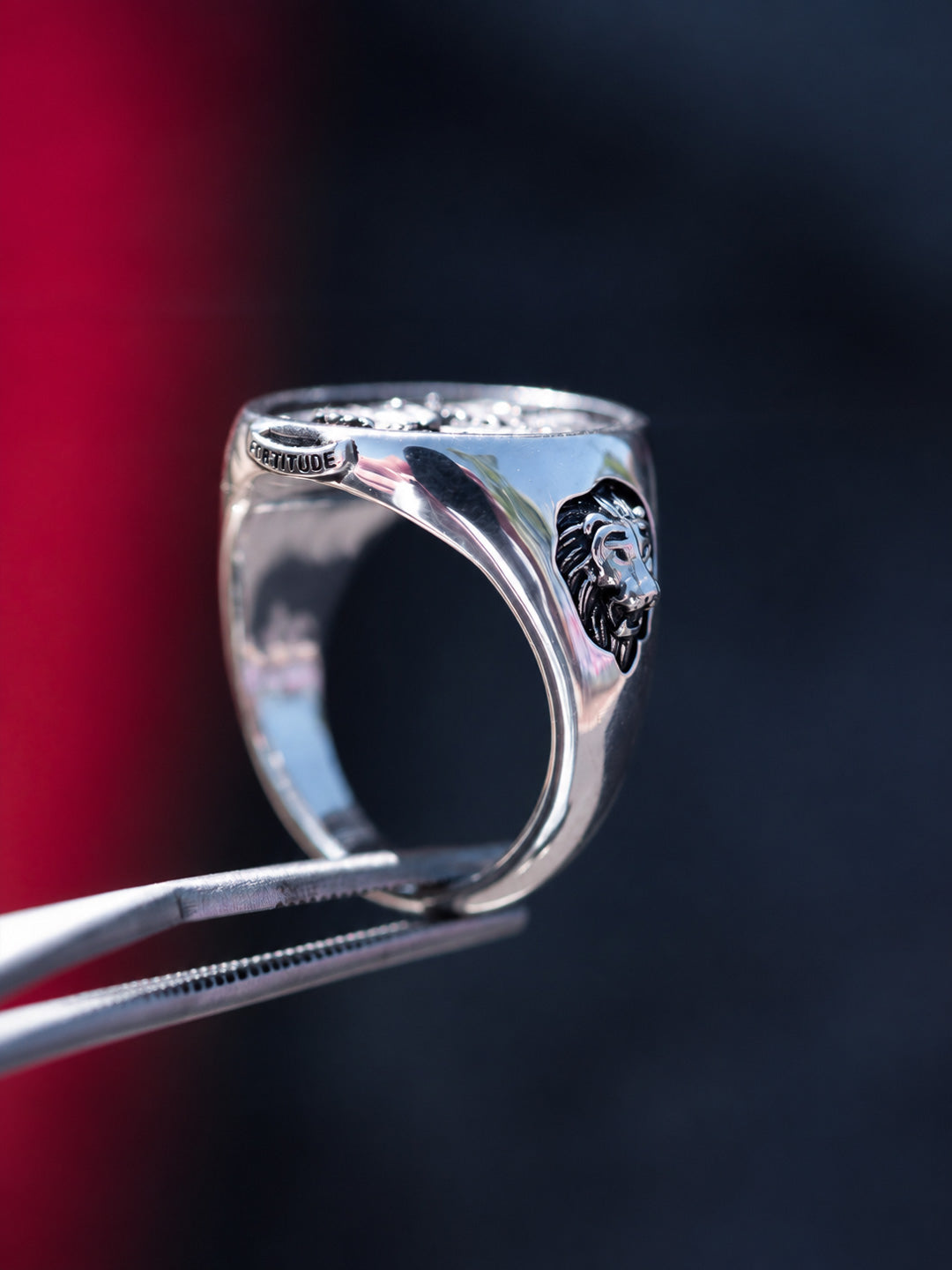 Hand-engraved silver family crest signet ring with heraldic shield, Fortitude motto and lion detail, by Illoom Sydney