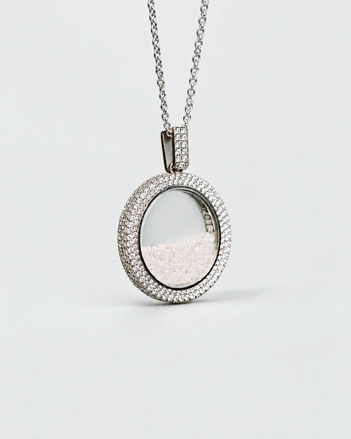 Memorial urn pendant in 18k white gold with pavé VVS diamonds, holds cremation ashes, by Illoom Sydney